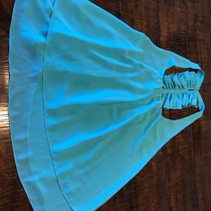 Flowing t back halter blouse